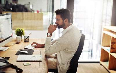 Man working from his home desk.
