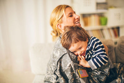 Military Women Hugging Son