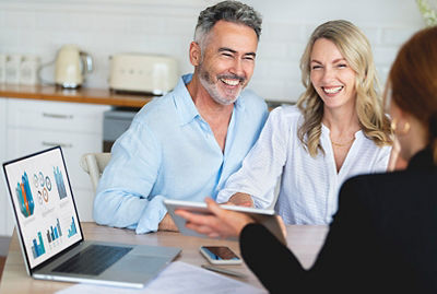 Couple meeting with wealth advisor