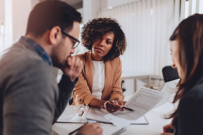 advisor going over details with clients