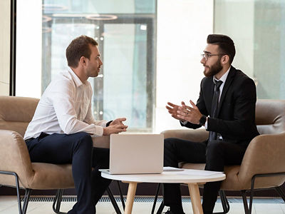 Two employees meeting