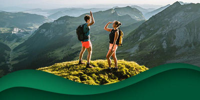 Couple high-fiving on mountain
