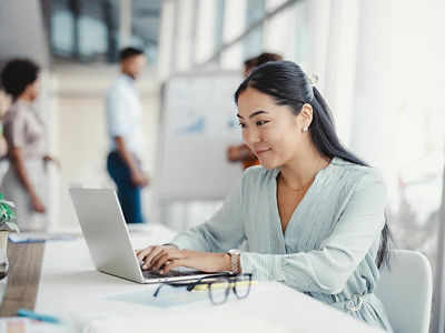 Young business woman on her laptop