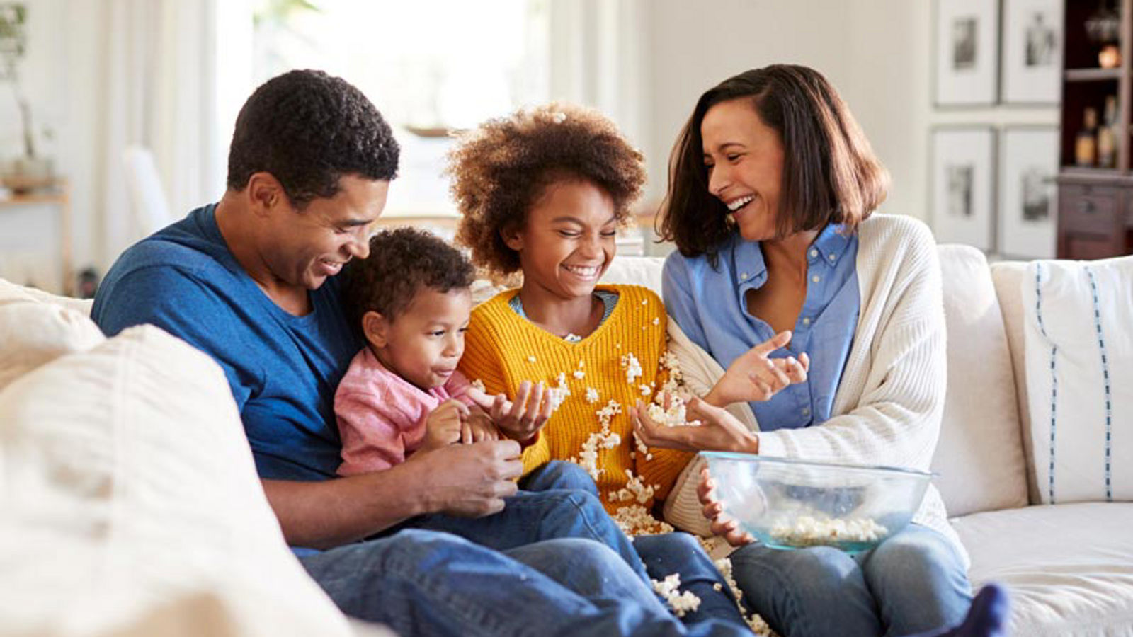 family on couch - refinance
