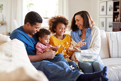 family on couch - refinance
