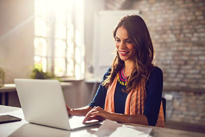 Woman filling out an online application