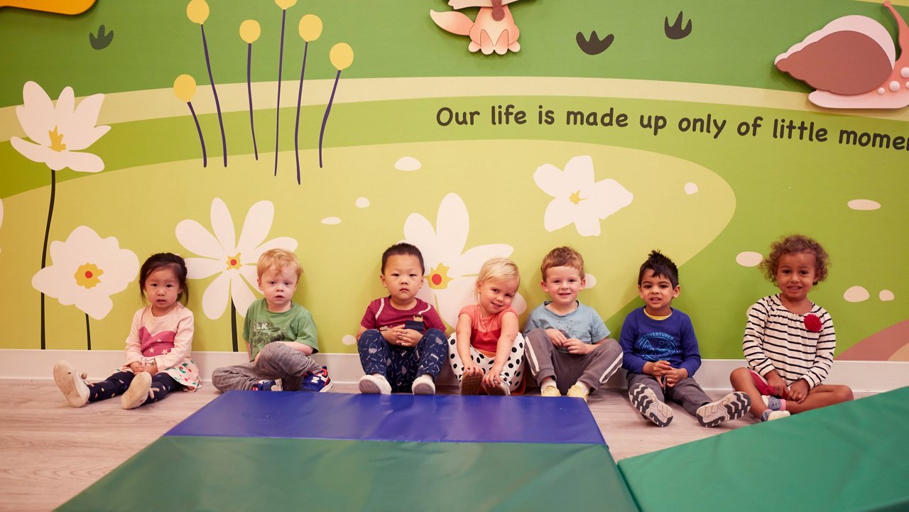 Toddlers in front of a mural at Maplewood NJ Goddard Schools