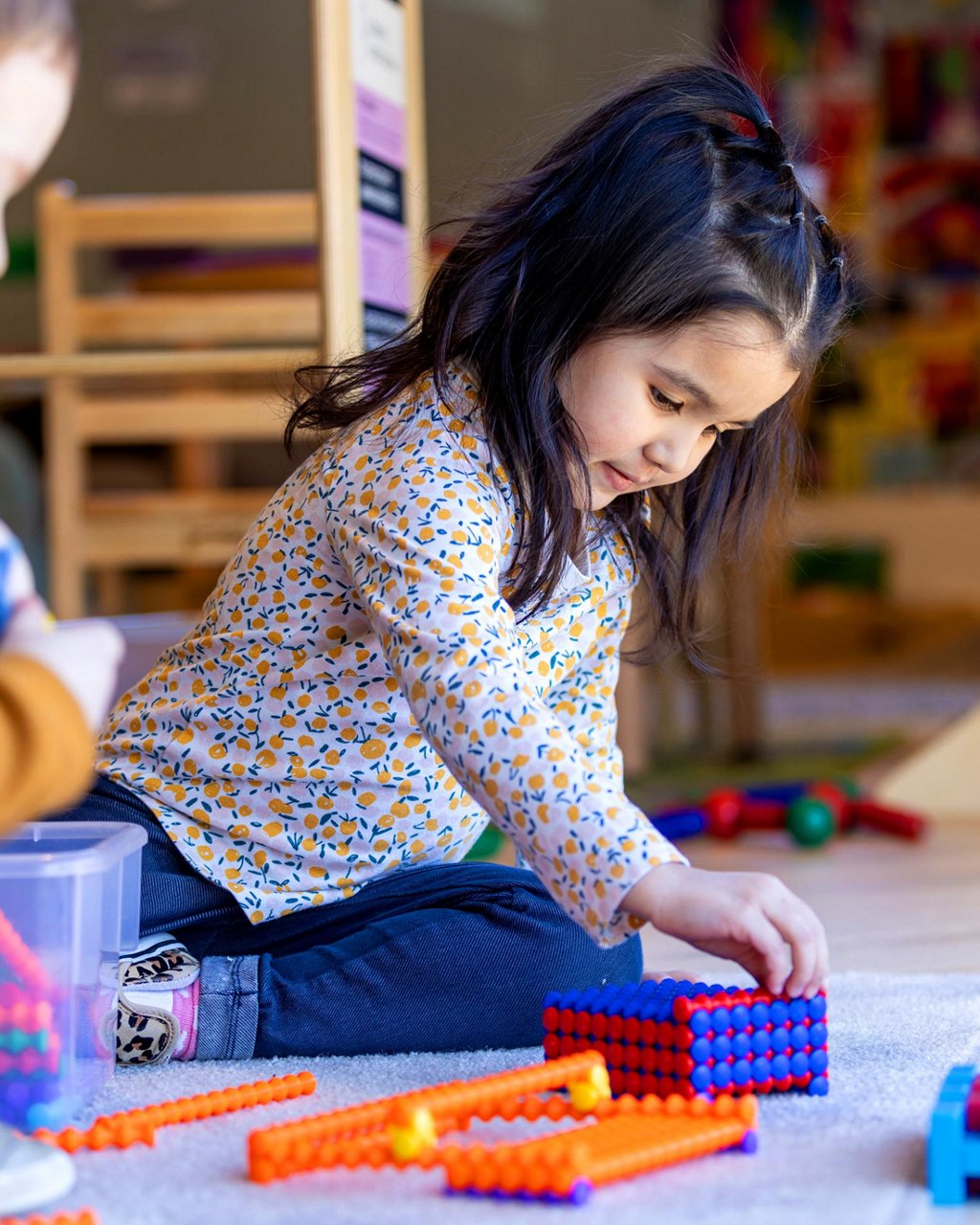 A  child building with magnets 