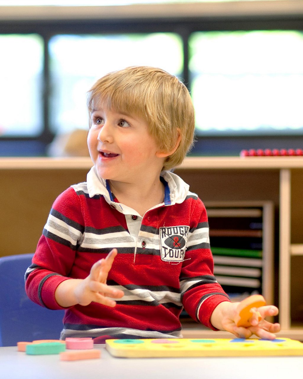 A child doing a number puzzle 