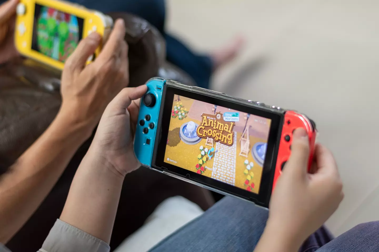 Children playing on a Nintendo Switch.