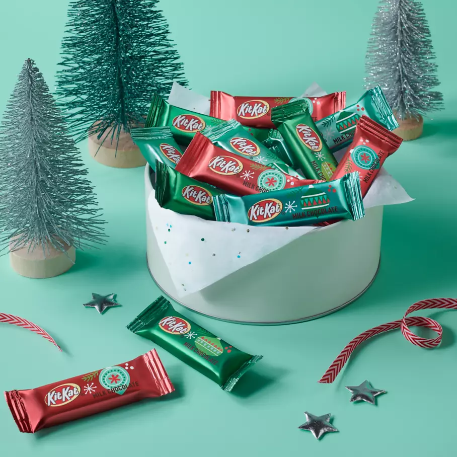 white bowl filled with kit kat holiday milk chocolate miniatures candy bars