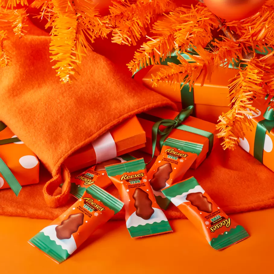 REESE'S Milk Chocolate Peanut Butter Snack Size Trees under the Christmas tree
