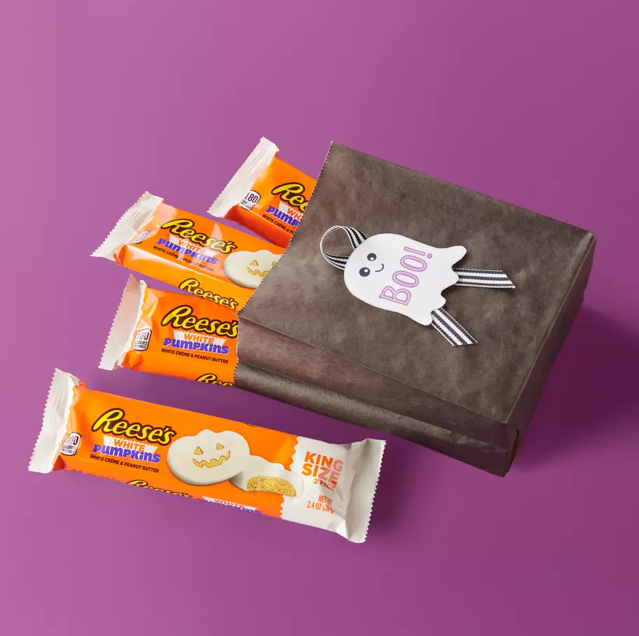 Ghost themed bag full of reeses white creme peanut butter king size pumpkins