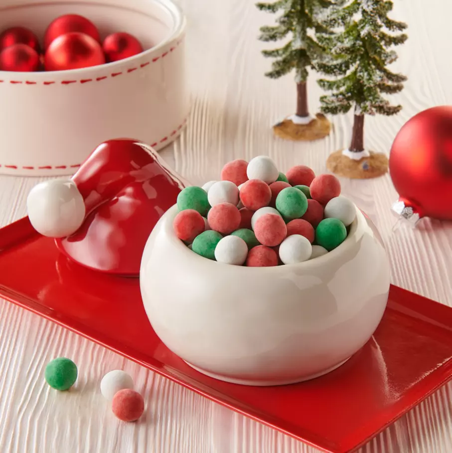 santa hat bowl filled with cadbury milk chocolate mini snow balls