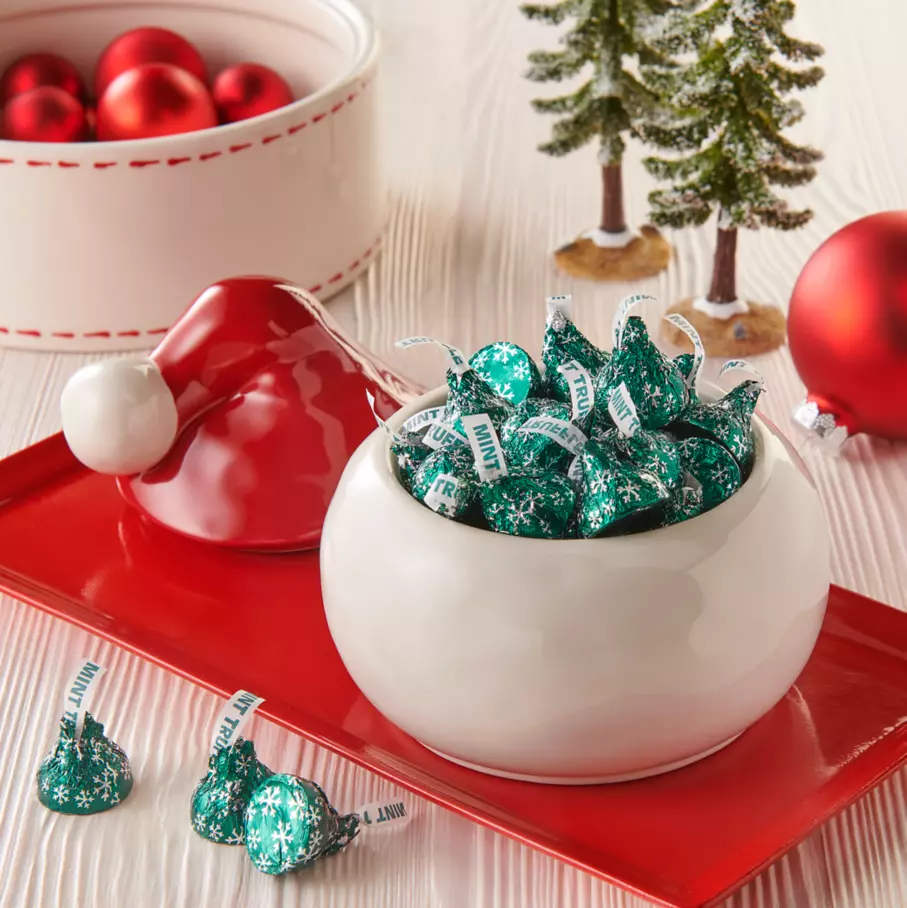 HERSHEY'S KISSES Mint Truffle Candy inside Santa hat bowl