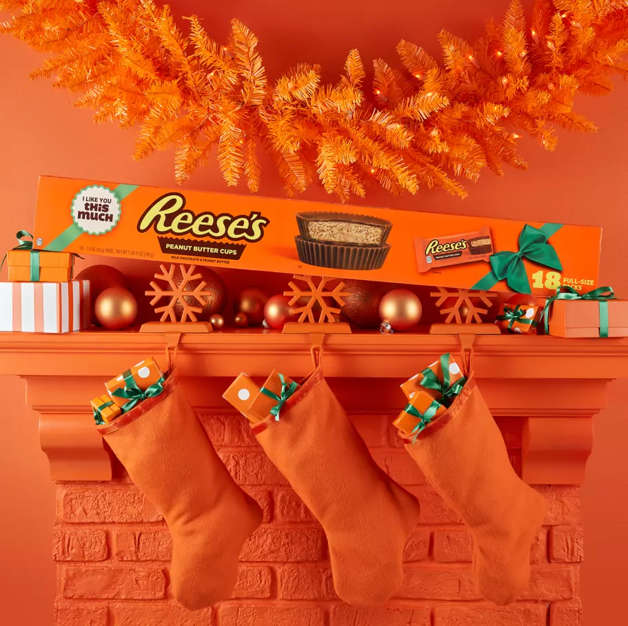 reeses holiday milk chocolate peanut butter cups yardstick on top of fireplace mantle