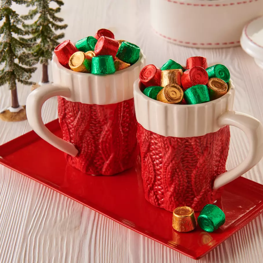 holiday themed mugs filled with rolo holiday creamy caramels in rich chocolate candy