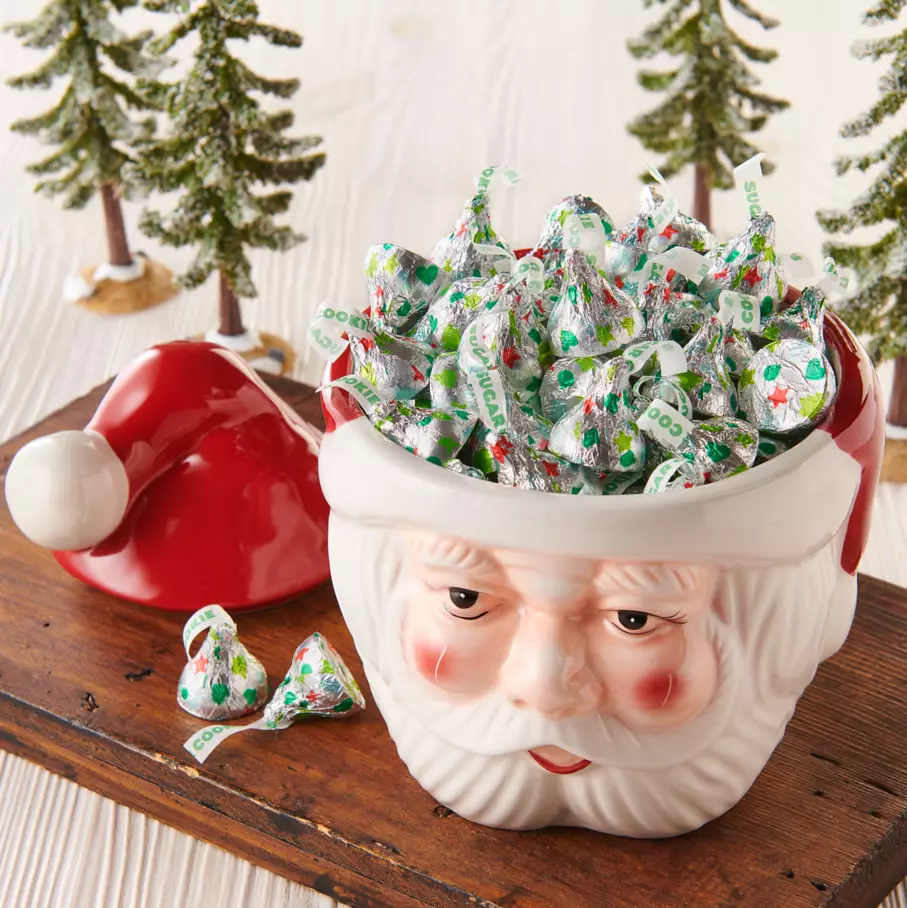 santa hat bowl filled with hersheys kisses sugar cookie white creme candy