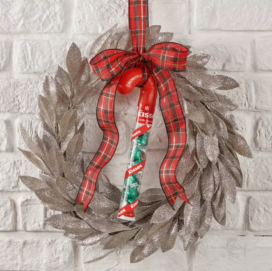 hersheys kisses holiday milk chocolate candy cane hanging from holiday wreath