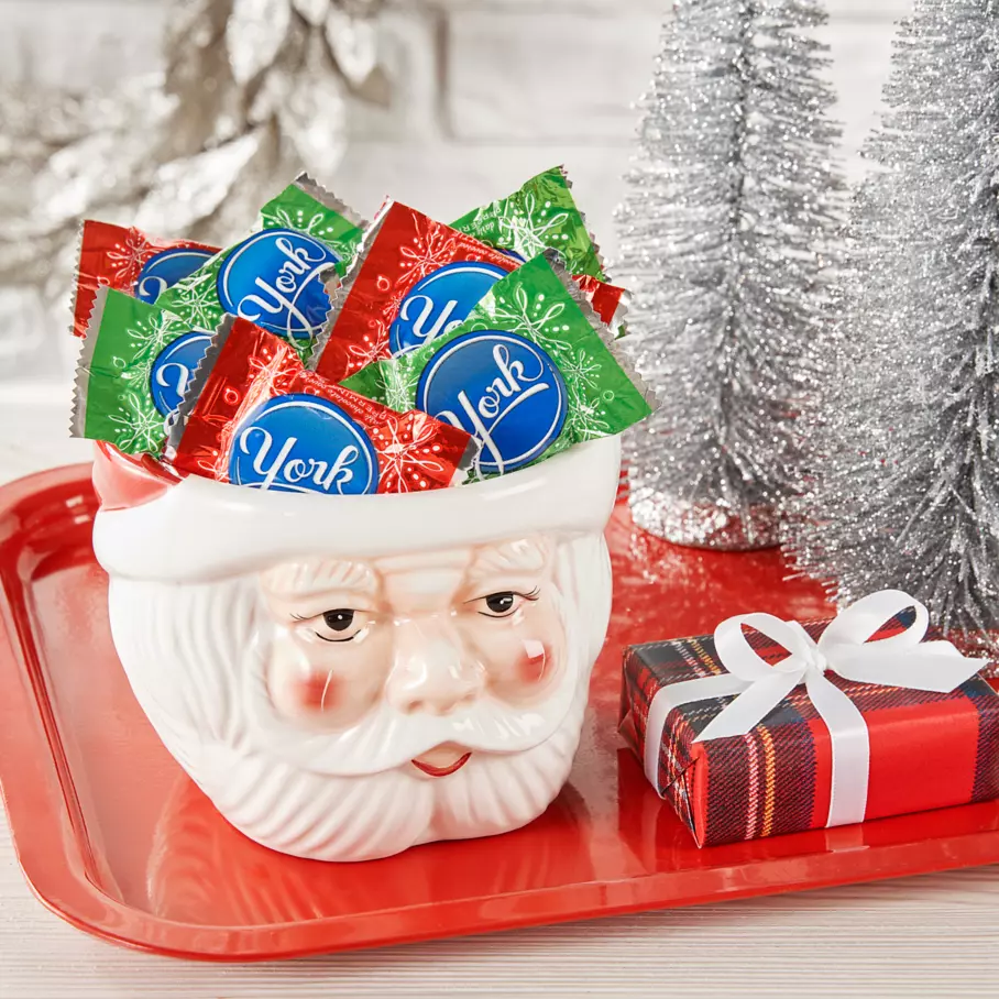 santa hat bowl filled with york snowflakes dark chocolate peppermint patties