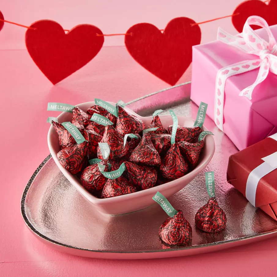 heart shaped bowl filled with hersheys kisses rose foils milk chocolate meltaway candy