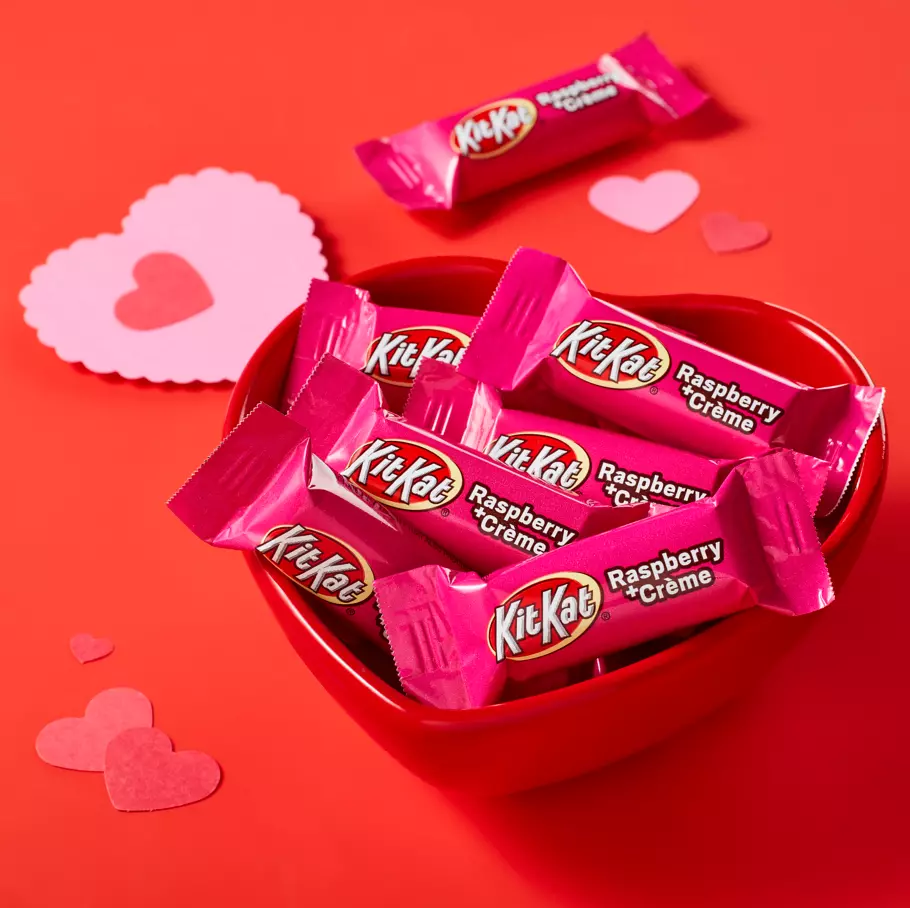 heart shaped bowl filled with kit kat valentines raspberry creme miniatures candy bars