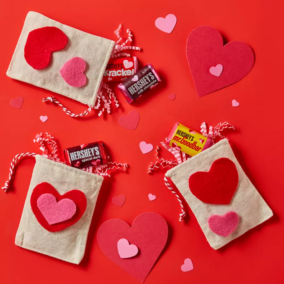 small cloth pouches filled with assorted hersheys valentines miniatures candy