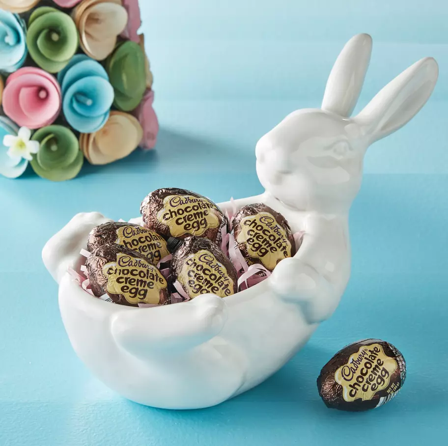 bunny shaped bowl filled with cadbury milk chocolate creme eggs