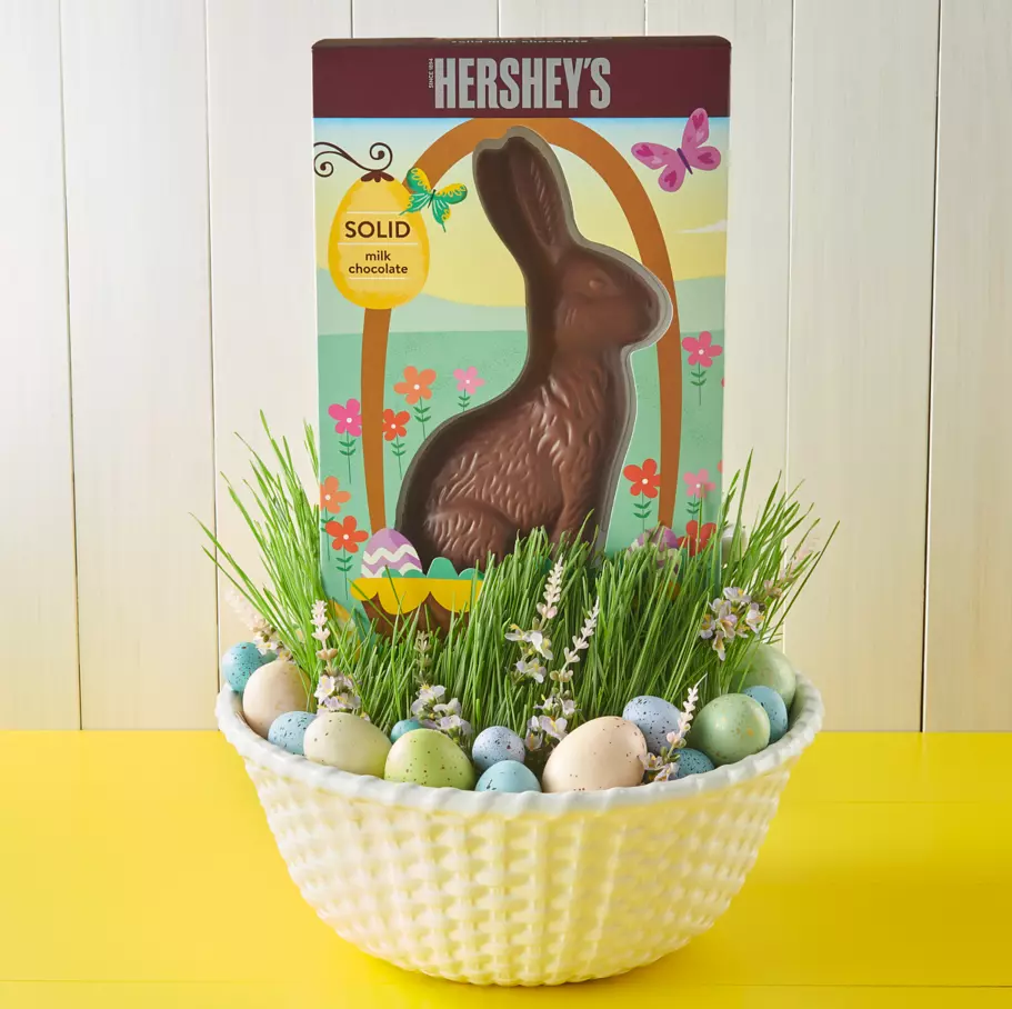 decorative bowl filled with easter eggs and box of hersheys solid milk chocolate bunny