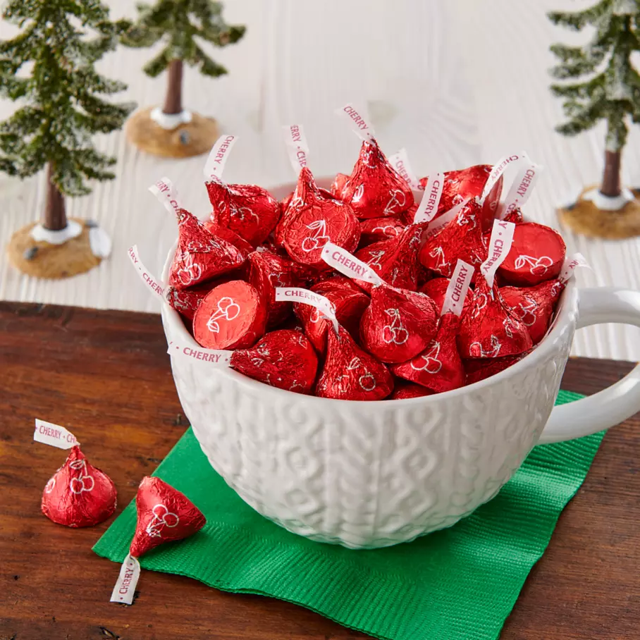 holiday themed mug filled with hersheys kisses cherry cordial candy