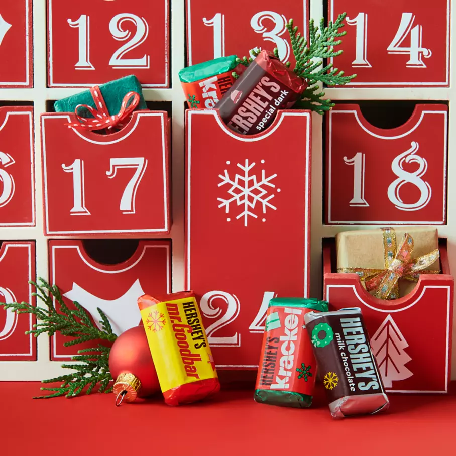advent calendar drawers filled with assorted hersheys holiday miniatures candy