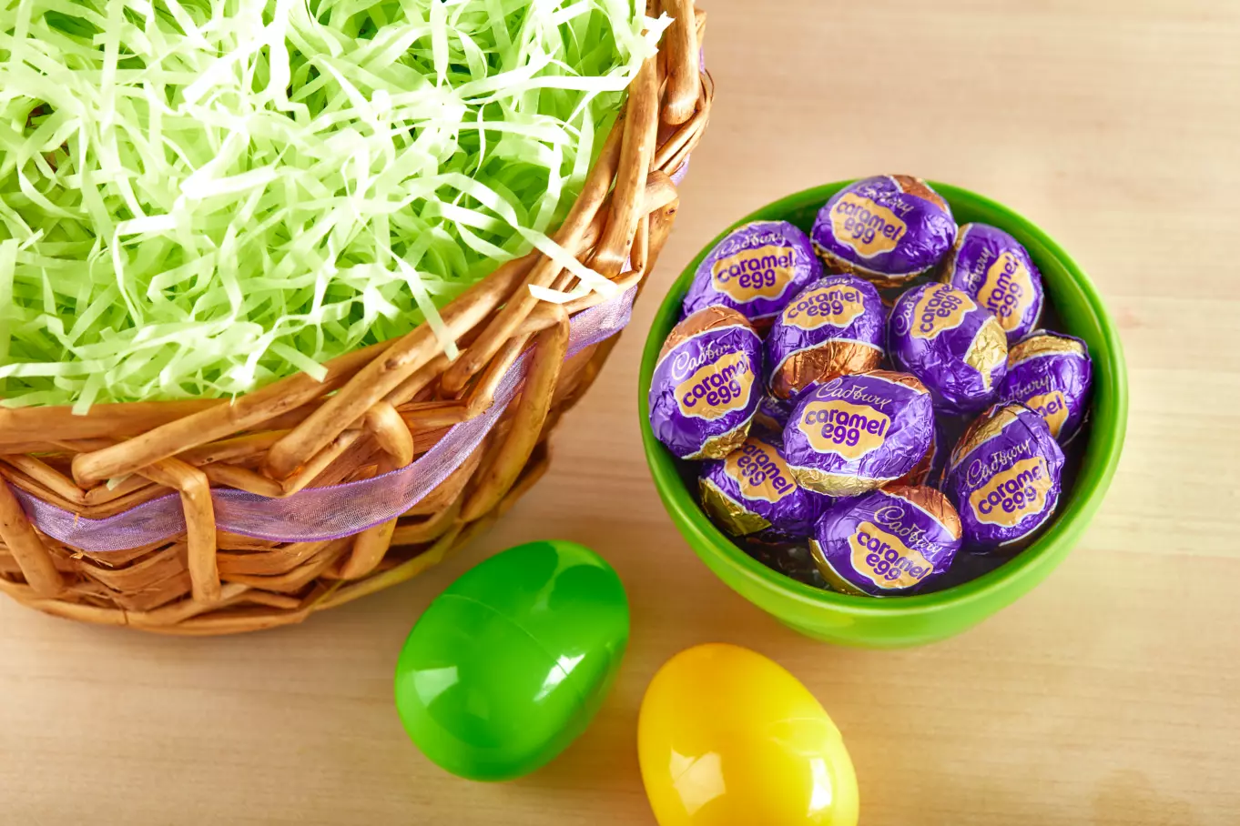 easter egg shaped bowl filled with cadbury caramel milk chocolate eggs