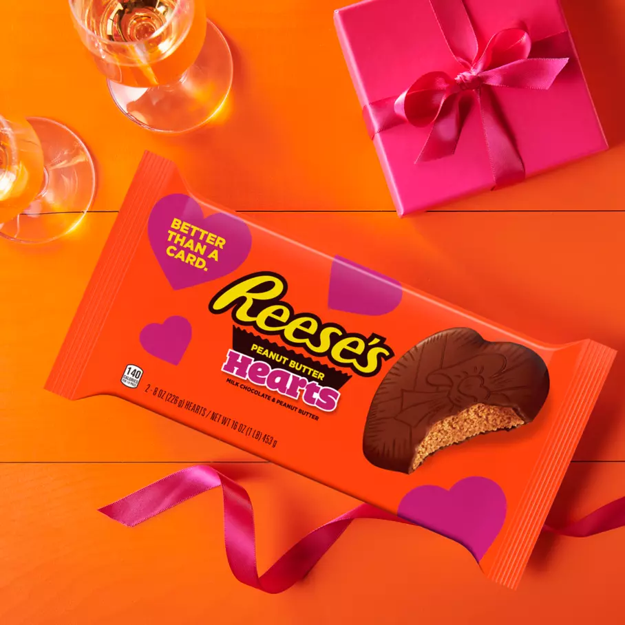 Package of REESE'S Milk Chocolate Peanut Butter Hearts on decorated table