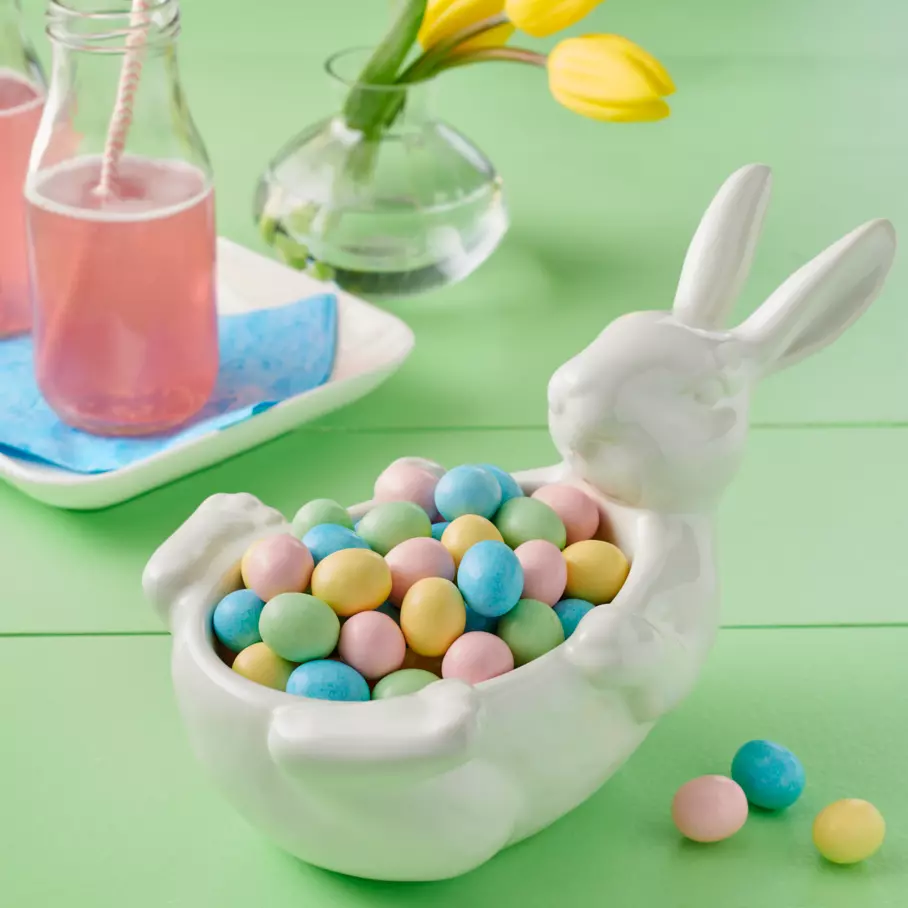 bunny shaped bowl filled with hersheys easter candy coated milk chocolate eggs