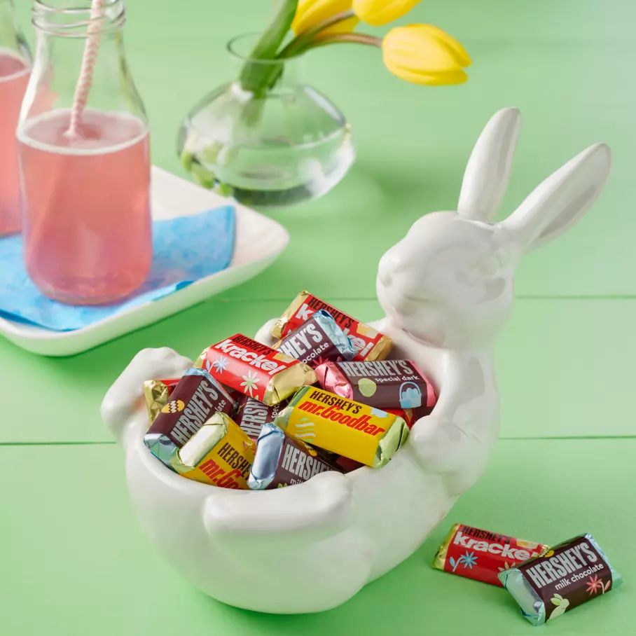 bunny shaped bowl filled with hersheys easter miniatures assorted candy