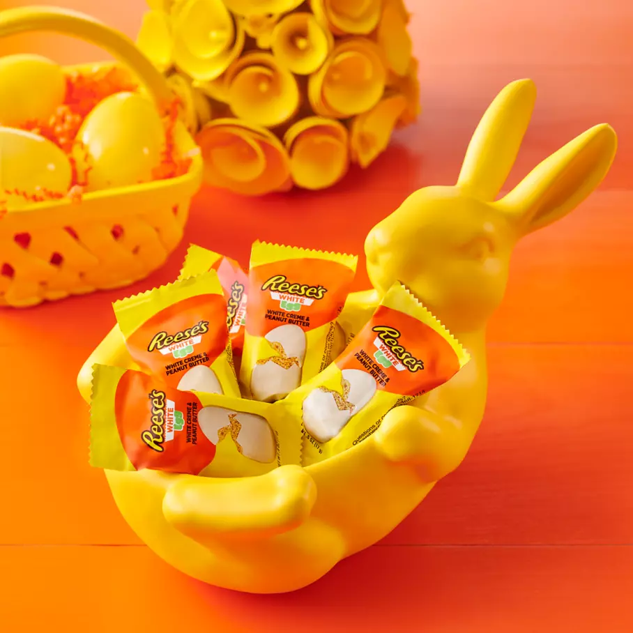 REESE'S White Creme Peanut Butter Snack Size Eggs inside bunny shaped bowl