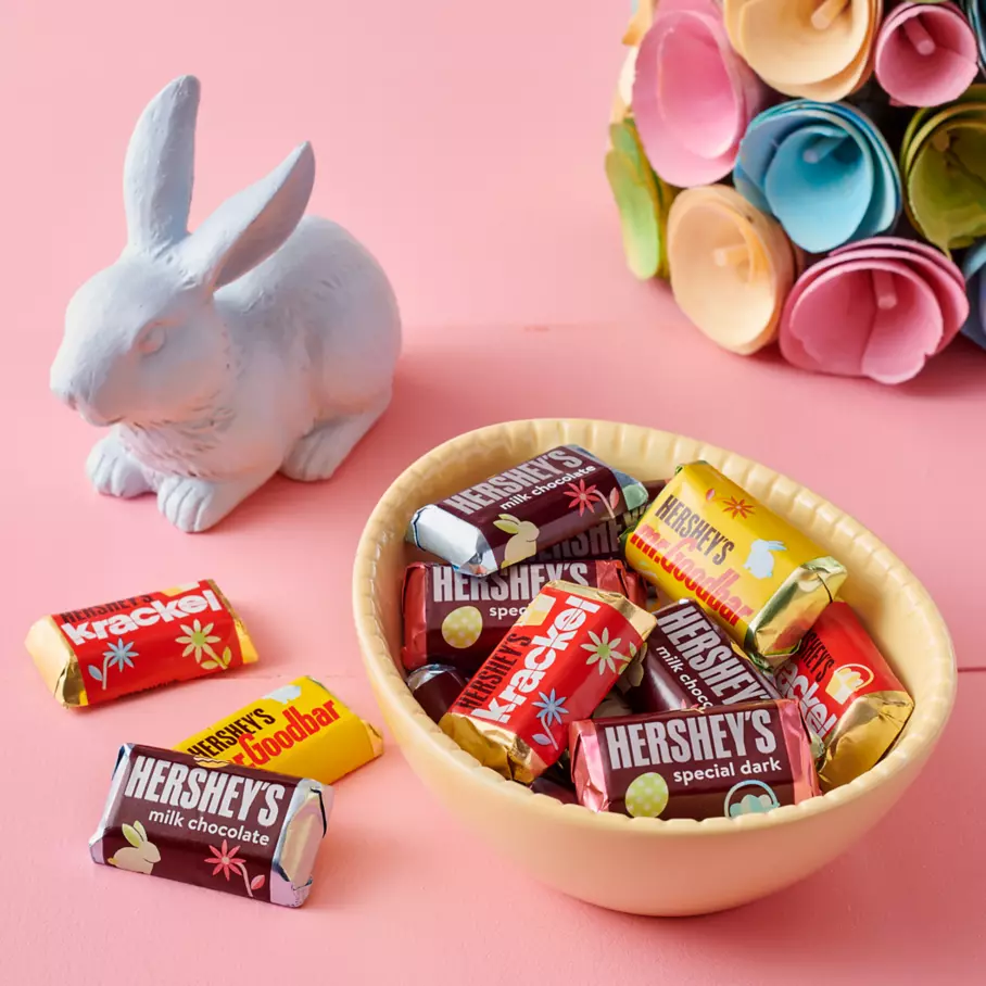 easter egg shaped bowl filled with hersheys easter miniatures assorted candy