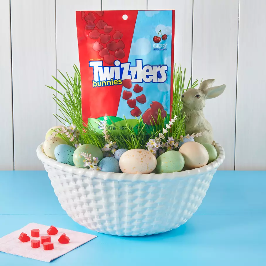 easter bowl filled with eggs and bag of twizzlers easter bunnies cherry candy