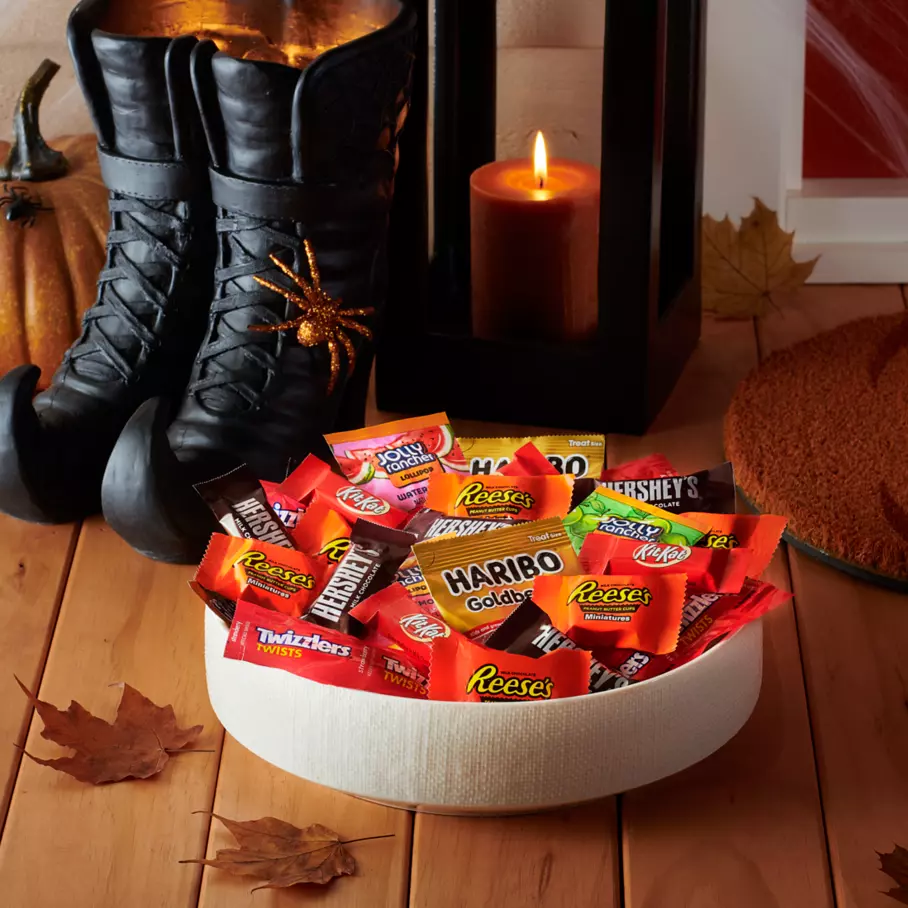 Bowl full of assorted hersheys miniatures candy on front porch