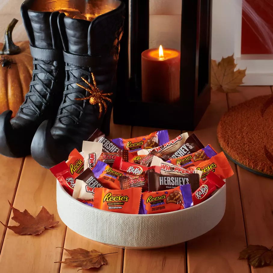Bowl full of assorted hersheys miniatures candy on front porch