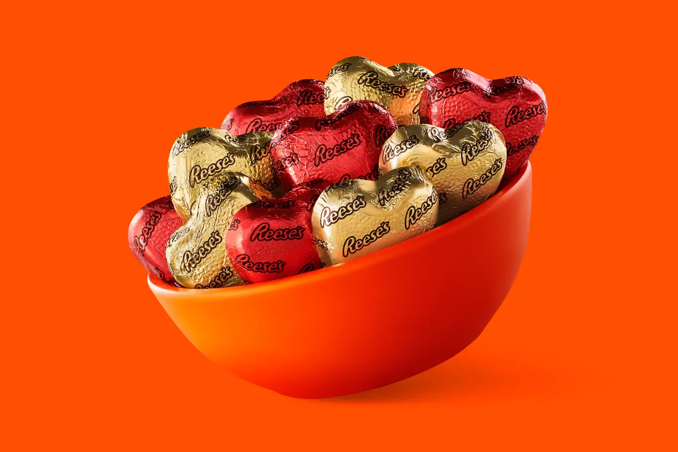 orange bowl filled with reeses milk chocolate peanut butter hearts