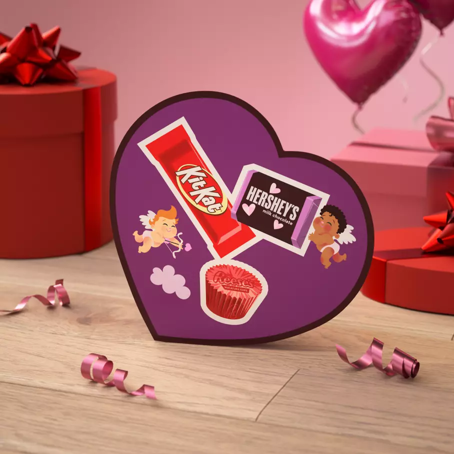 hershey valentines milk chocolate assortment box surrounded by gifts and balloons