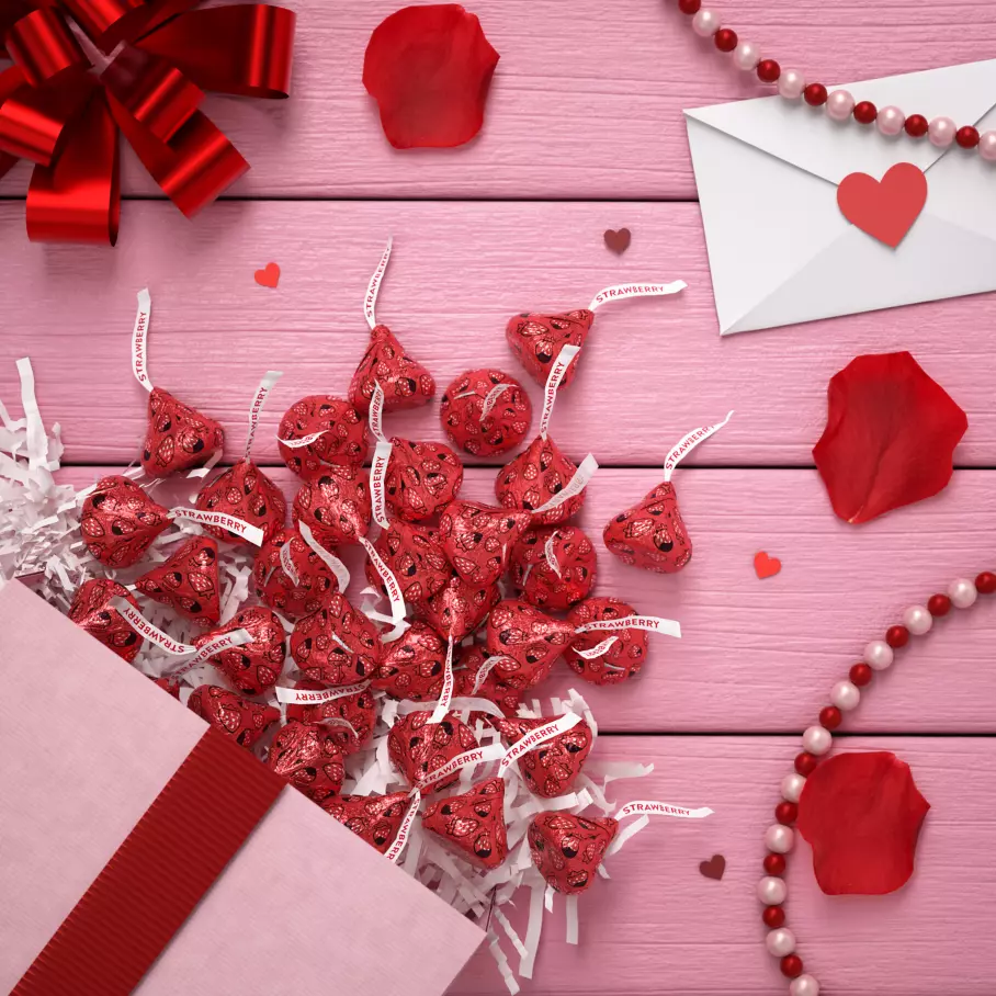 gift bag filled with hersheys kisses chocolate dipped strawberry candy