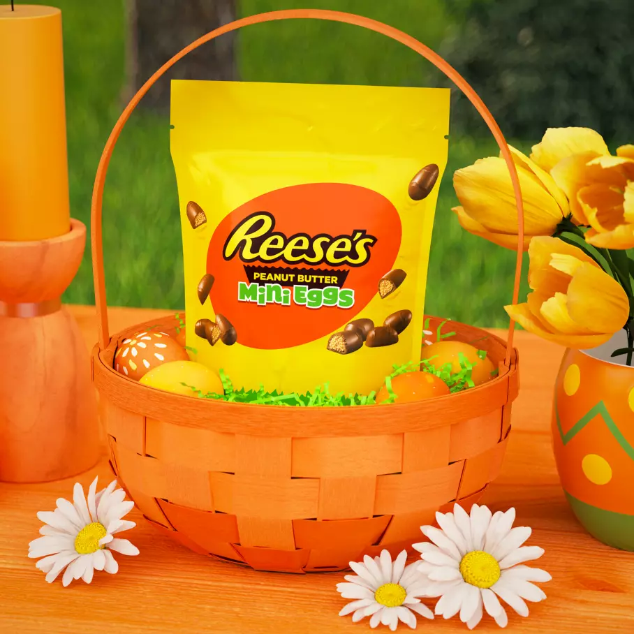 easter basket filled with bag of reeses milk chocolate peanut butter mini eggs