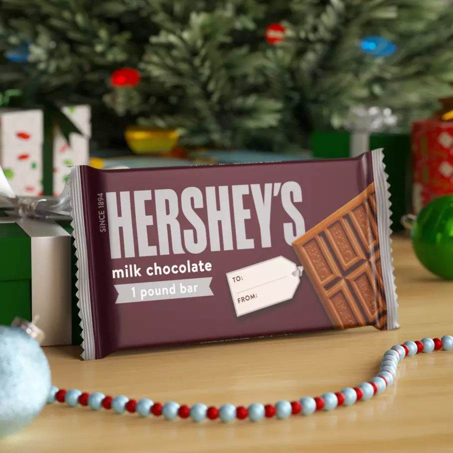 hersheys holiday milk chocolate candy bar under christmas tree