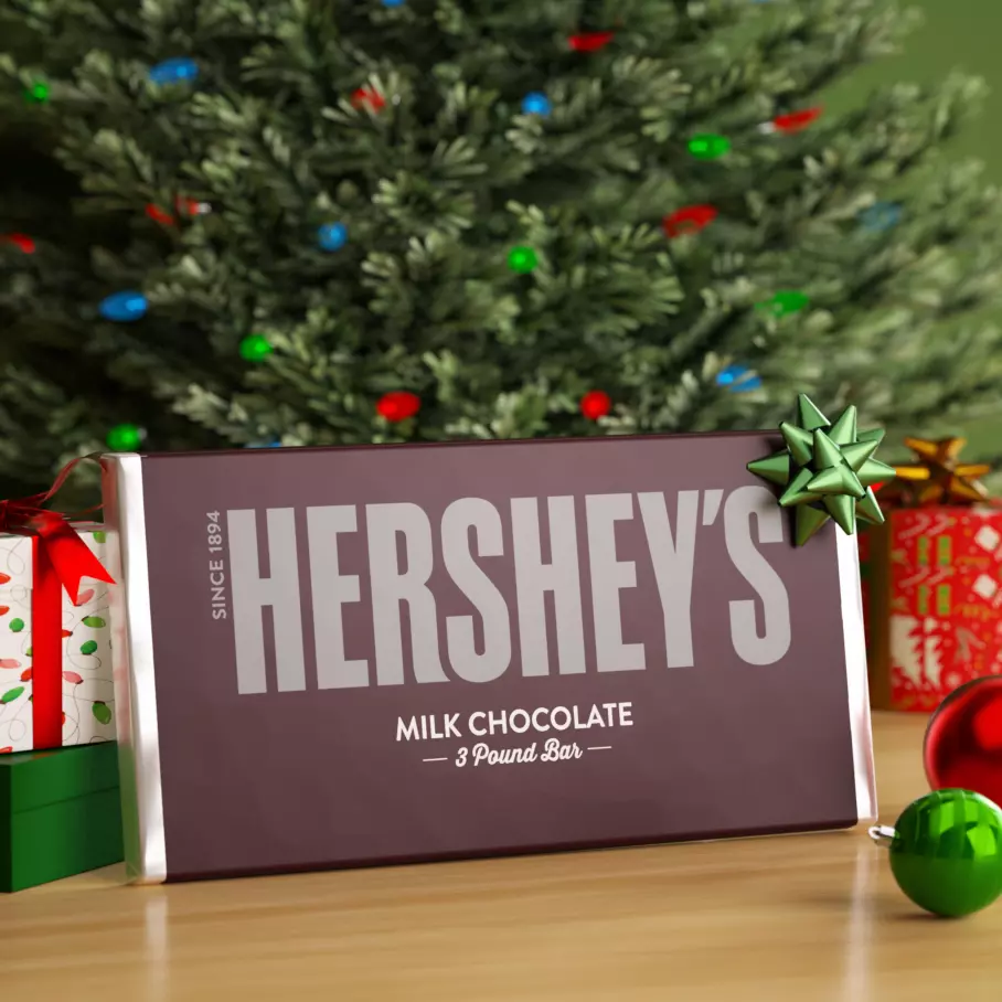HERSHEY'S Milk Chocolate Candy Bar under the Christmas tree