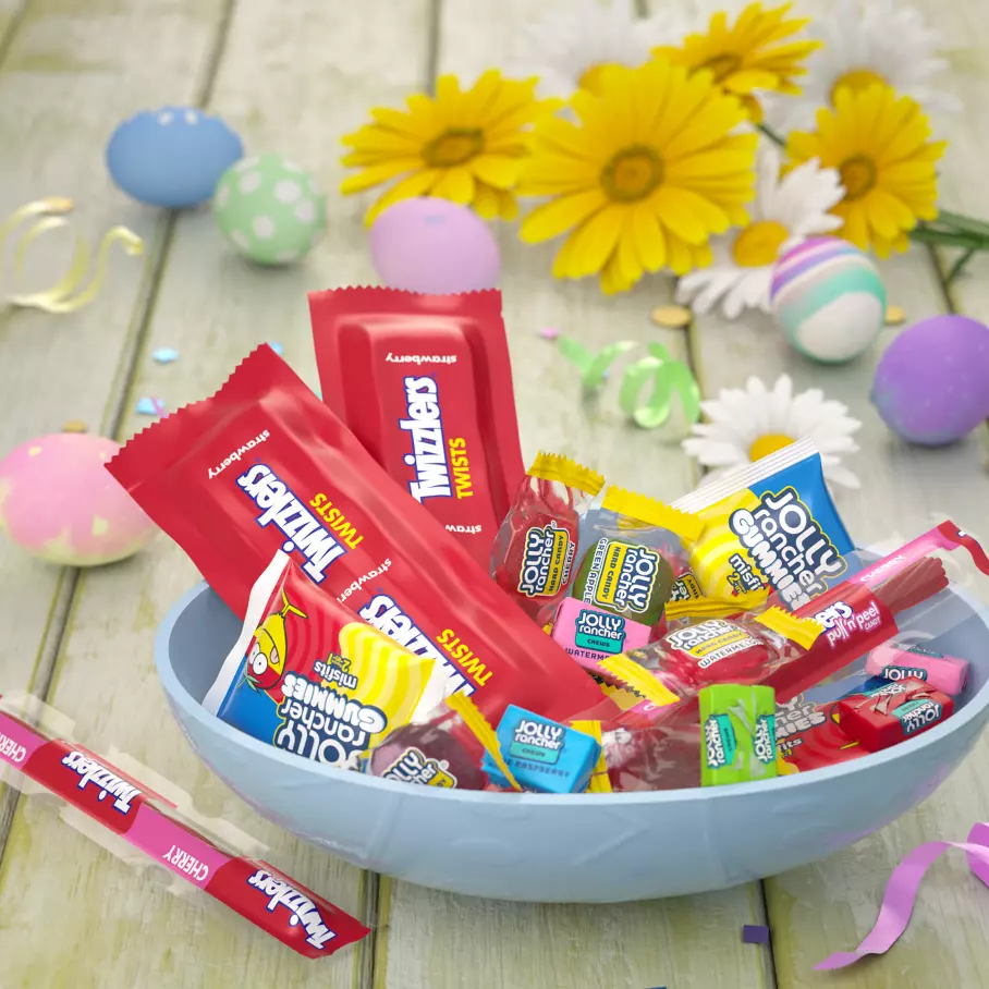 Assorted Hershey Candies inside Easter egg shaped bowl