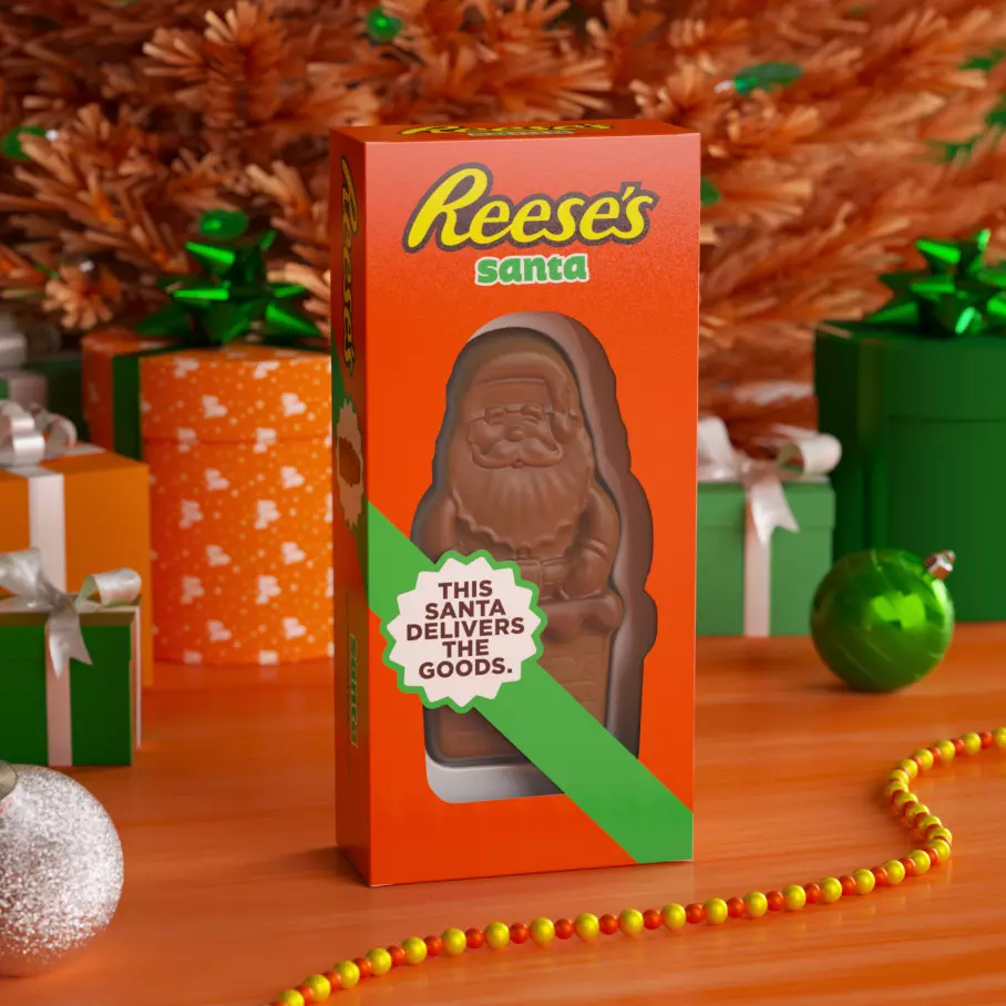 REESE'S Peanut Butter Santa under the Christmas tree