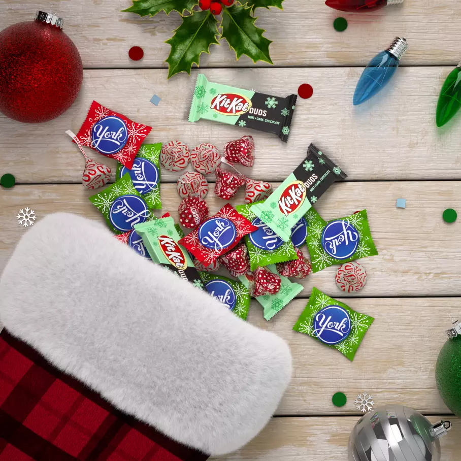 christmas stocking filled with assorted hersheys holiday mint candy