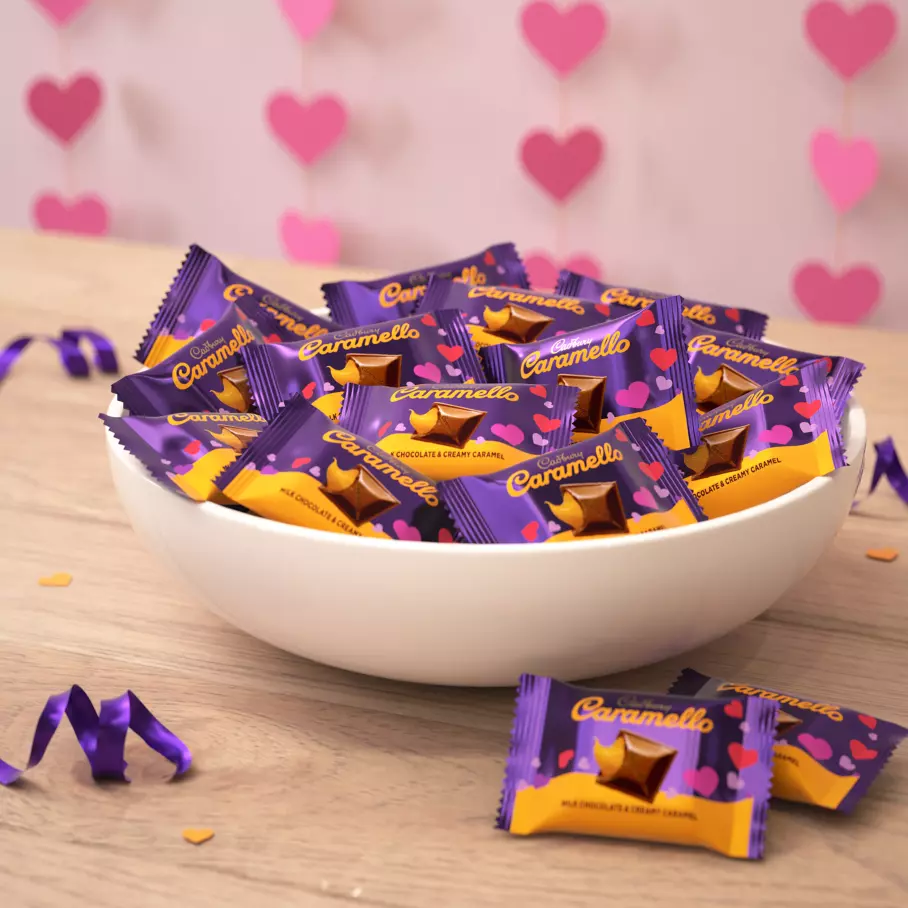bowl full of individually wrapped cadbury caramello miniature candy bars